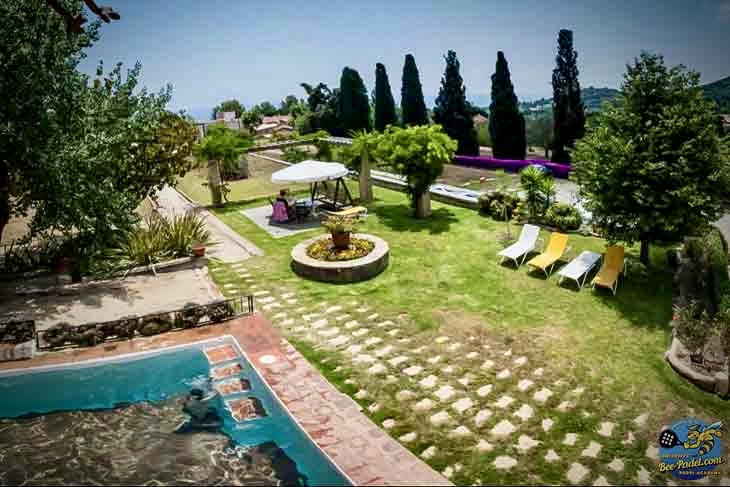 Private luxury villa and resort with padel court access in a tropical setting.