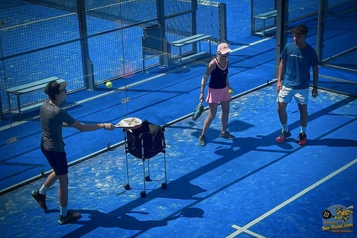 Close-up of players training during an intensive Bee-Padel camp on the panoramic padel courts at SorliSport in Vilassar, Barcelona.