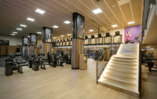 Exclusive members-only fitness room at Club Natació Atlètic-Barceloneta with modern equipment and professional training environment.