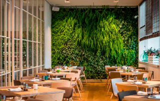 Interior of Sorli Emocions Restaurant with elegant dining setup and relaxed ambiance after padel training