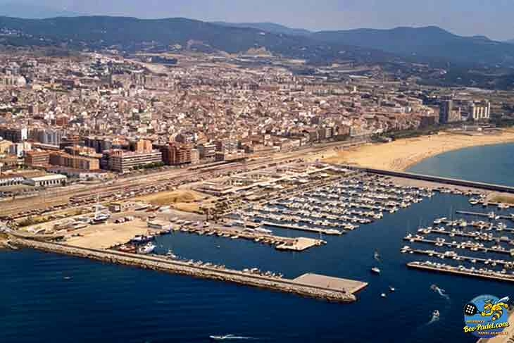 Aerial view of Mataró city showing the historic town centre, harbour, and beautiful Mediterranean waterfront