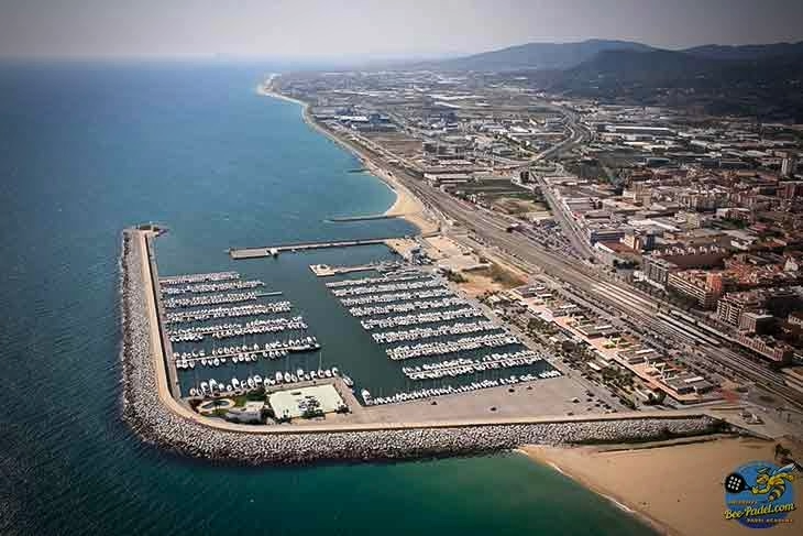 Aerial view of Mataró harbour with Hotel Atenea Port and Bee-Padel courts in the background