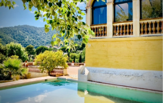 Stunning mountain view from the swimming pool at Masia Can Casadellà, inviting full relaxation and enjoyment