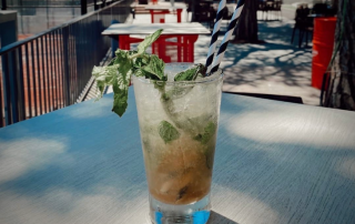 Relaxing with a long drink on the terrace after intensive padel training at Can Teixidó Pàdel Club