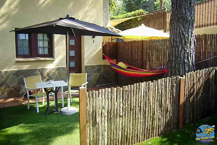 Room at Villa Cal Music B&B with private terrace featuring a hammock, offering shade and sun with great room service
