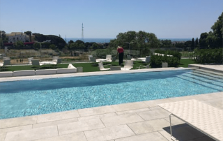 Infinity pool on the rooftop of Hotel Sorli Emocions with panoramic views over Barcelona and the Mediterranean Sea
