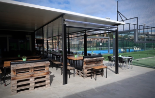 View from the terrace overlooking the centre padel court at Masnou Ocata Padel Club, Barcelona