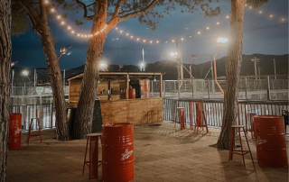 Terrace fully set up and ready to celebrate the weekend at Can Teixidó Padel Club, inviting relaxation and socializing