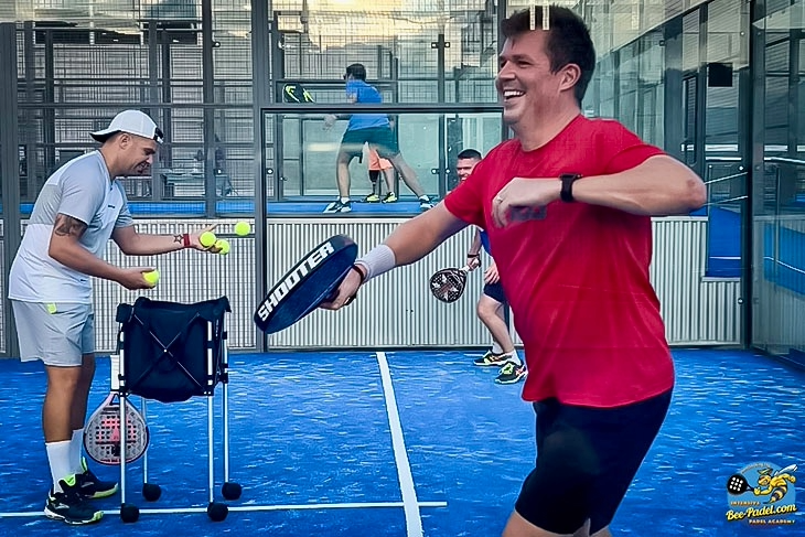 Players in action at Bee-Padel training camp with world-class coaching on outdoor padel courts